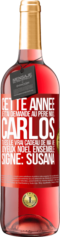 «Cette année je t'ai demandé au Père Noël. Carlos tu es le vrai cadeau de ma vie. Joyeux Noël ensemble. Signé: Susana» Édition ROSÉ