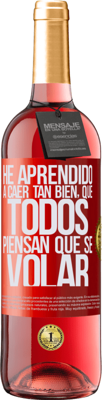 29,95 € Envío gratis | Vino Rosado Edición ROSÉ He aprendido a caer tan bien, que todos piensan que sé volar Etiqueta Roja. Etiqueta personalizable Vino joven Cosecha 2025 Tempranillo