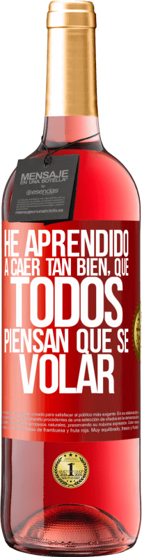 29,95 € Spedizione Gratuita | Vino rosato Edizione ROSÉ Ho imparato a cadere così bene che tutti pensano che io sappia volare Etichetta Rossa. Etichetta personalizzabile Vino giovane Raccogliere 2025 Tempranillo