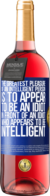 29,95 € | Rosé Wine ROSÉ Edition The greatest pleasure of an intelligent person is to appear to be an idiot in front of an idiot who appears to be intelligent Blue Label. Customizable label Young wine Harvest 2023 Tempranillo