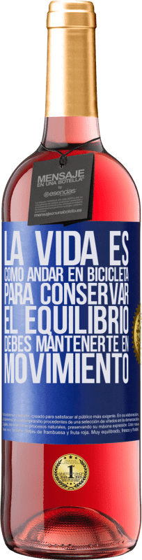 29,95 € | Vino Rosado Edición ROSÉ La vida es como andar en bicicleta. Para conservar el equilibrio debes mantenerte en movimiento Etiqueta Azul. Etiqueta personalizable Vino joven Cosecha 2023 Tempranillo