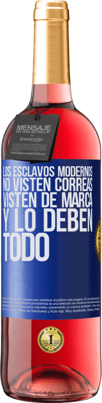 29,95 € | Vino Rosado Edición ROSÉ Los esclavos modernos no visten correas. Visten de marca y lo deben todo Etiqueta Azul. Etiqueta personalizable Vino joven Cosecha 2024 Tempranillo