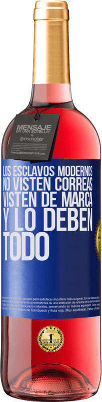 29,95 € | Vino Rosado Edición ROSÉ Los esclavos modernos no visten correas. Visten de marca y lo deben todo Etiqueta Azul. Etiqueta personalizable Vino joven Cosecha 2025 Tempranillo