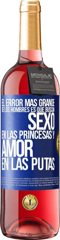 Envío gratis | Vino Rosado Edición ROSÉ El error más grande de los hombres es que buscan sexo en las princesas y amor en las putas Etiqueta Azul. Etiqueta personalizable Vino joven Cosecha 2023 Tempranillo