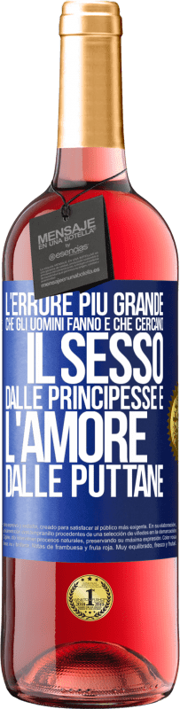 Spedizione Gratuita | Vino rosato Edizione ROSÉ L'errore più grande che gli uomini fanno è che cercano il sesso dalle principesse e l'amore dalle puttane Etichetta Blu. Etichetta personalizzabile Vino giovane Raccogliere 2023 Tempranillo