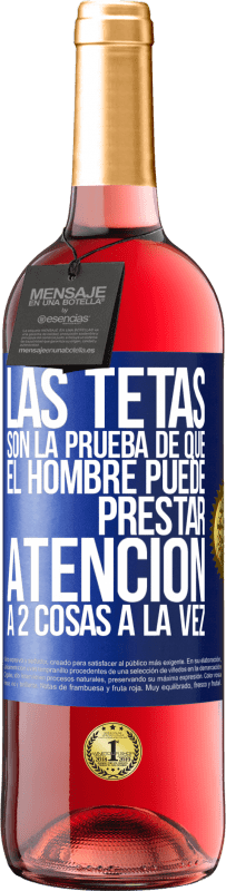 29,95 € | Vino Rosado Edición ROSÉ Las tetas son la prueba de que el hombre puede prestar atención a 2 cosas a la vez Etiqueta Azul. Etiqueta personalizable Vino joven Cosecha 2025 Tempranillo