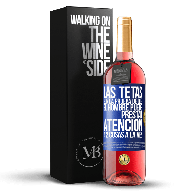 29,95 € Envío gratis | Vino Rosado Edición ROSÉ Las tetas son la prueba de que el hombre puede prestar atención a 2 cosas a la vez Etiqueta Azul. Etiqueta personalizable Vino joven Cosecha 2023 Tempranillo