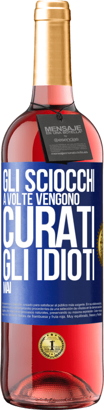 29,95 € Spedizione Gratuita | Vino rosato Edizione ROSÉ Gli sciocchi a volte vengono curati, gli idioti mai Etichetta Blu. Etichetta personalizzabile Vino giovane Raccogliere 2025 Tempranillo