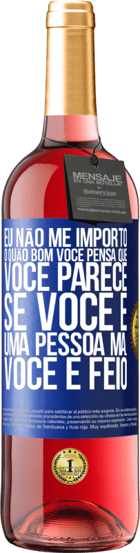 Envio grátis | Vinho rosé Edição ROSÉ Eu não me importo o quão bom você pensa que você parece, se você é uma pessoa má ... você é feio Etiqueta Azul. Etiqueta personalizável Vinho jovem Colheita 2023 Tempranillo