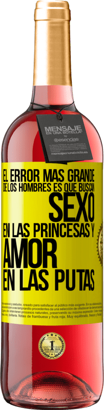 29,95 € Envío gratis | Vino Rosado Edición ROSÉ El error más grande de los hombres es que buscan sexo en las princesas y amor en las putas Etiqueta Amarilla. Etiqueta personalizable Vino joven Cosecha 2025 Tempranillo