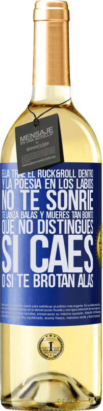 29,95 € | Vino Blanco Edición WHITE Ella trae el Rock&Roll dentro y la poesía en los labios. No te sonríe, te lanza balas, y mueres tan bonito, que no Etiqueta Azul. Etiqueta personalizable Vino joven Cosecha 2024 Verdejo