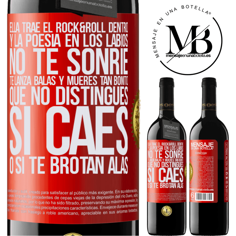 39,95 € Envío gratis | Vino Tinto Edición RED MBE Reserva Ella trae el Rock&Roll dentro y la poesía en los labios. No te sonríe, te lanza balas, y mueres tan bonito, que no Etiqueta Roja. Etiqueta personalizable Reserva 12 Meses Cosecha 2014 Tempranillo