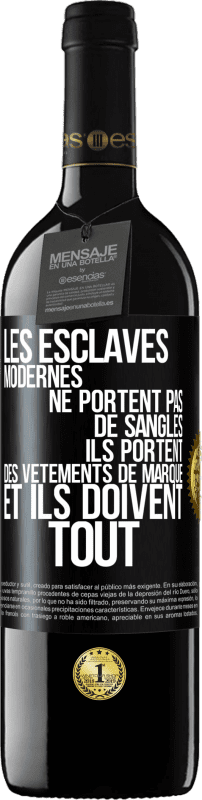 39,95 € | Vin rouge Édition RED MBE Réserve Les esclaves modernes ne portent pas de sangles. Ils portent des vêtements de marque et ils doivent tout Étiquette Noire. Étiquette personnalisable Réserve 12 Mois Récolte 2016 Tempranillo