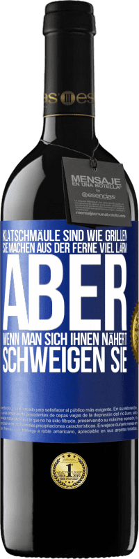 39,95 € Kostenloser Versand | Rotwein RED Ausgabe MBE Reserve Klatschmäule sind wie Grillen: sie machen aus der Ferne viel Lärm, aber wenn man sich ihnen nähert, schweigen sie Blaue Markierung. Anpassbares Etikett Reserve 12 Monate Ernte 2016 Tempranillo