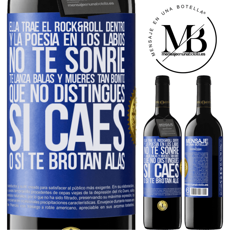 39,95 € Envío gratis | Vino Tinto Edición RED MBE Reserva Ella trae el Rock&Roll dentro y la poesía en los labios. No te sonríe, te lanza balas, y mueres tan bonito, que no Etiqueta Azul. Etiqueta personalizable Reserva 12 Meses Cosecha 2016 Tempranillo
