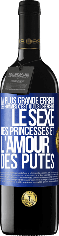 Envoi gratuit | Vin rouge Édition RED MBE Réserve La plus grande erreur des hommes c'est qu'ils cherchent le sexe des princesses et l'amour des putes Étiquette Bleue. Étiquette personnalisable Réserve 12 Mois Récolte 2014 Tempranillo