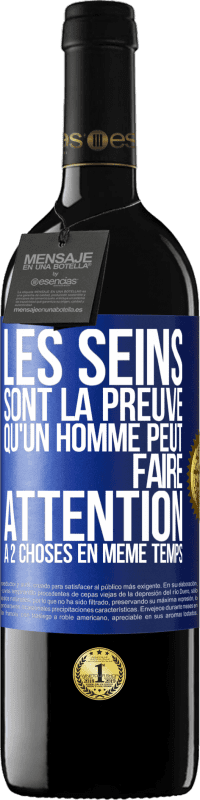 Envoi gratuit | Vin rouge Édition RED MBE Réserve Les seins sont la preuve qu'un homme peut faire attention à 2 choses en même temps Étiquette Bleue. Étiquette personnalisable Réserve 12 Mois Récolte 2014 Tempranillo