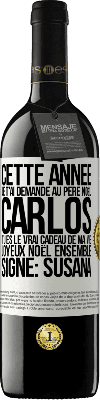 «Cette année je t'ai demandé au Père Noël. Carlos tu es le vrai cadeau de ma vie. Joyeux Noël ensemble. Signé: Susana» Édition RED MBE Réserve