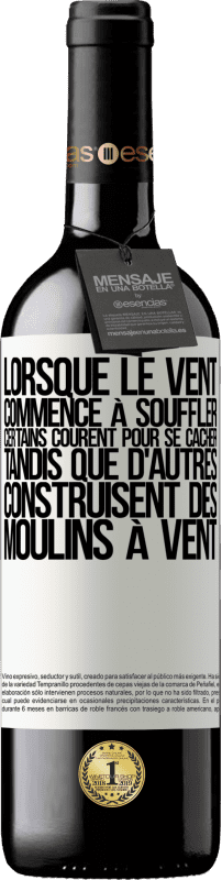 Envoi gratuit | Vin rouge Édition RED MBE Réserve Lorsque le vent commence à souffler, certains courent pour se cacher, tandis que d'autres construisent des moulins à vent Étiquette Blanche. Étiquette personnalisable Réserve 12 Mois Récolte 2016 Tempranillo