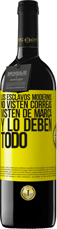 39,95 € | Vino Tinto Edición RED MBE Reserva Los esclavos modernos no visten correas. Visten de marca y lo deben todo Etiqueta Amarilla. Etiqueta personalizable Reserva 12 Meses Cosecha 2016 Tempranillo