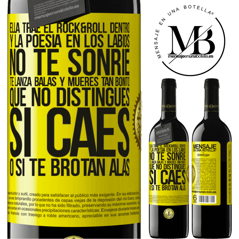 39,95 € Envío gratis | Vino Tinto Edición RED MBE Reserva Ella trae el Rock&Roll dentro y la poesía en los labios. No te sonríe, te lanza balas, y mueres tan bonito, que no Etiqueta Amarilla. Etiqueta personalizable Reserva 12 Meses Cosecha 2016 Tempranillo