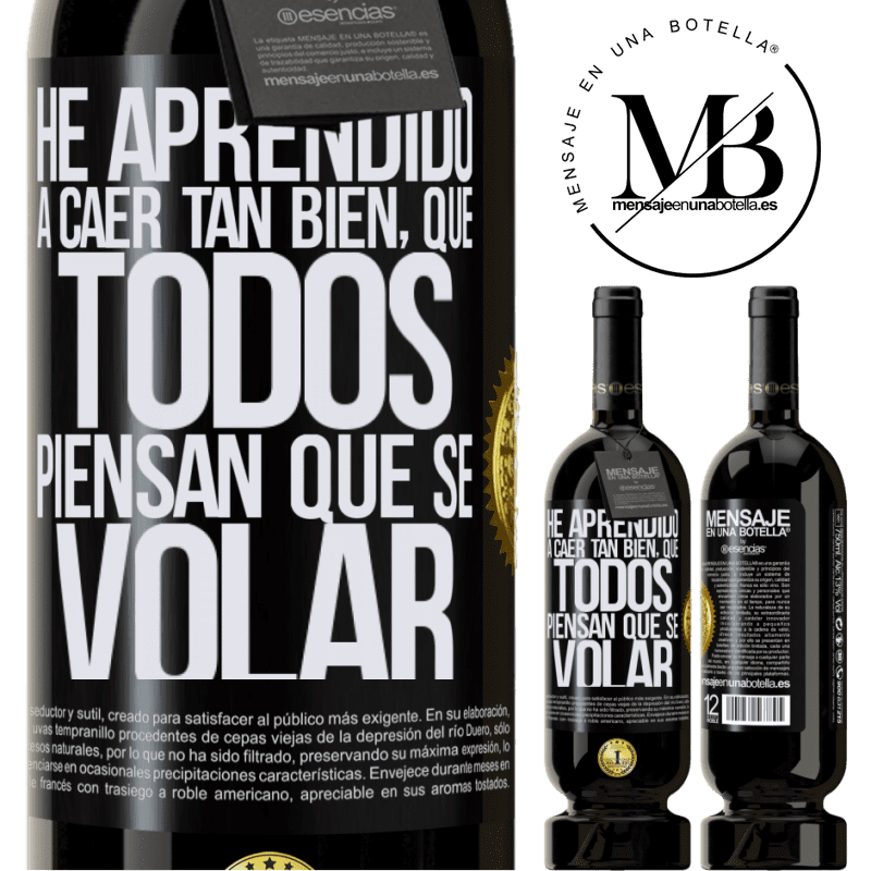 39,95 € Envío gratis | Vino Tinto Edición Premium MBS® Reserva He aprendido a caer tan bien, que todos piensan que sé volar Etiqueta Negra. Etiqueta personalizable Reserva 12 Meses Cosecha 2015 Tempranillo