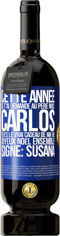 Envoi gratuit | Vin rouge Édition Premium MBS® Réserve Cette année je t'ai demandé au Père Noël. Carlos tu es le vrai cadeau de ma vie. Joyeux Noël ensemble. Signé: Susana Étiquette Bleue. Étiquette personnalisable Réserve 12 Mois Récolte 2014 Tempranillo