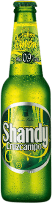 22,95 € Spedizione Gratuita | Scatola da 24 unità Birra Cruzcampo Shandy Bottiglietta 25 cl Limón — Limone