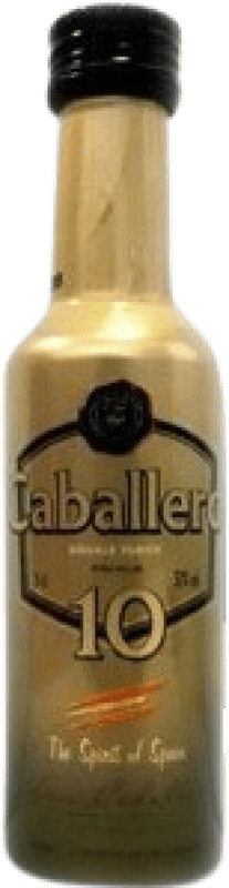 Envío gratis | Licores Caballero Ponche 10 España Botellín Miniatura 5 cl