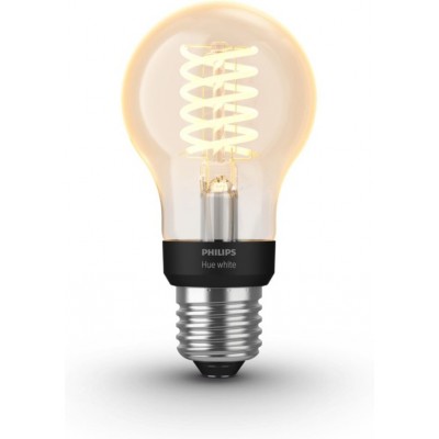 Ampoule LED télécommandée Philips Filamento Hue White 7W E27 LED 2100K Lumière très chaude. Ø 6 cm. Filament standard. Contrôle Bluetooth avec application smartphone ou voix